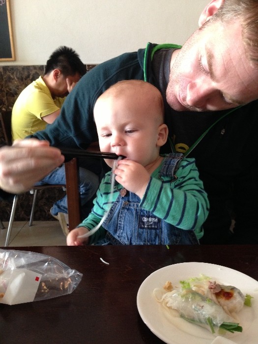 Baby Lukas learning the fine art that is eating noodles off of chopsticks. Photo by Emily Staresina.